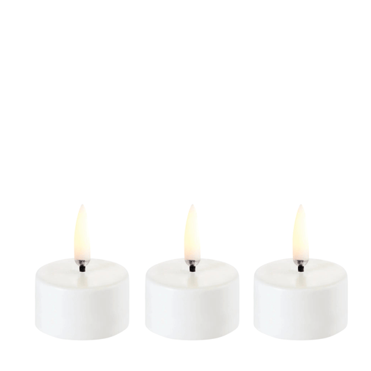 Minimalist White LED Candles for Elegant Interiors