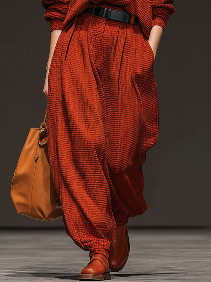 Retro-Inspired Red Waffle Knit Sweater with Round Neck and Sporty Trousers